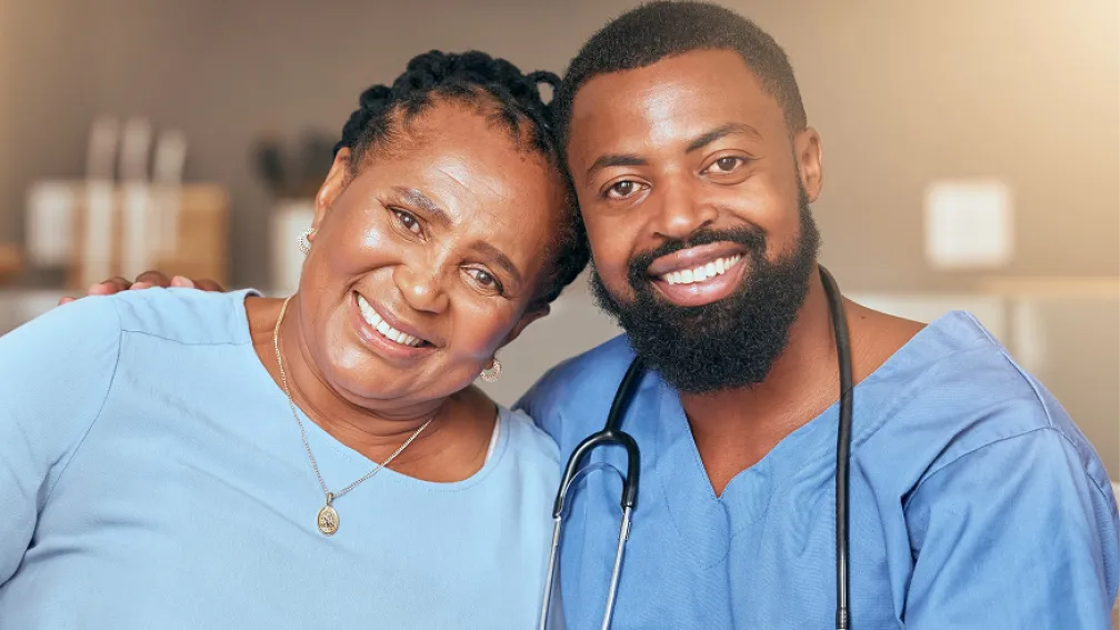 smiling woman and a male doctor